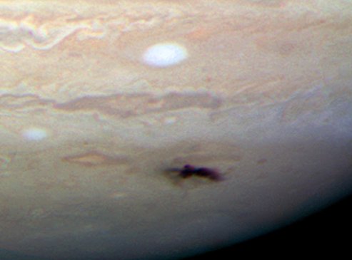 In 2009, amateur astronomer Anthony Wesley noticed a dark mark on Jupiter.  It turned out to be a scar from a comet impact.  Read more about the 2009 impact on Jupiter here.
