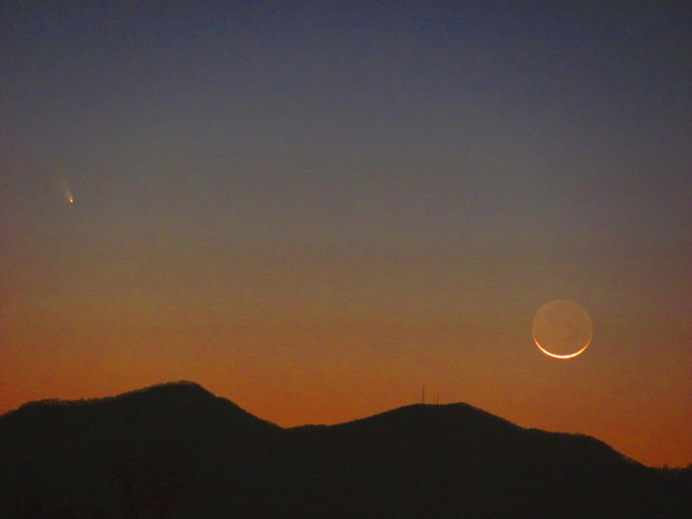 Comet PANSTARRS near the moon on March 12 - as seen by EarthSky Facebook friend Gary P. Caton in Asheville, North Carolina. he wrote, 