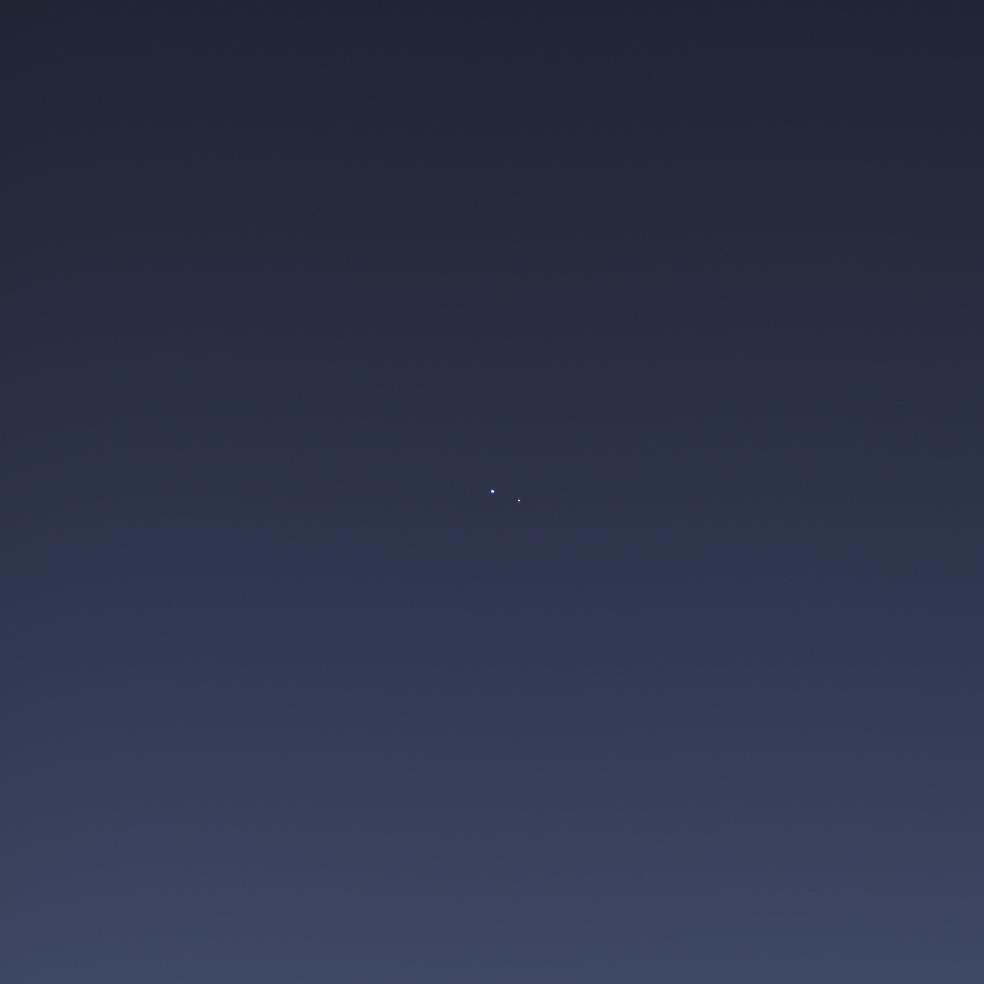 View larger. | Earth and moon seen from Saturn July 19, 2013