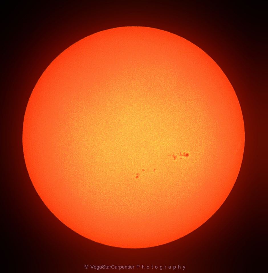 View larger. | EarthSky Facebook friend VegaStar Carpentier captured this wonderful image of a large active region on the sun's surface on July 9, 2013. You could fit 11 planet Earth's in front of this grouping of sunspots.