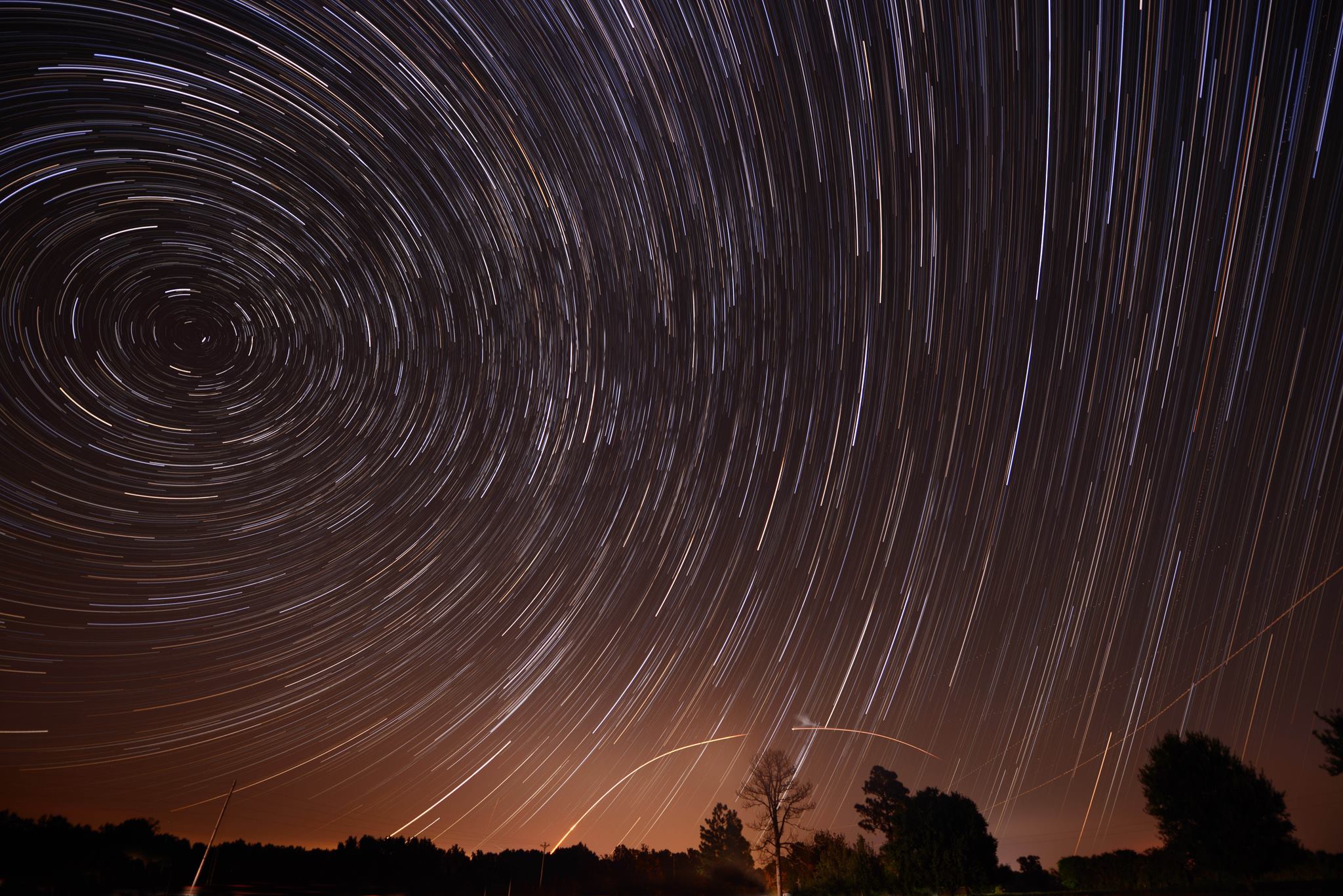 View larger. | Here is the entire startrail image made by Ken Christison. It incorporates the LADEE launch last night ((also see photo above). 183 images stacked with startrails.exe. Shot with the Nikon D800 with 14-24 wide angle lens at 14mm, f/2.8, ISO 400, 30 sec. exposures.