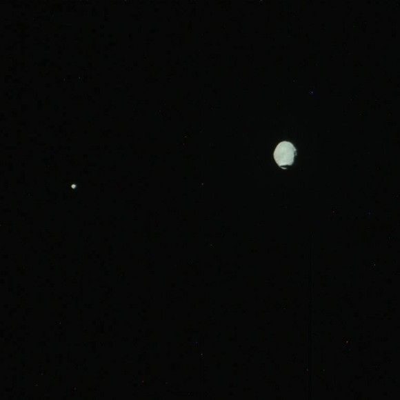 Deimos (l) and Phobos, two moons in the sky of Mars.