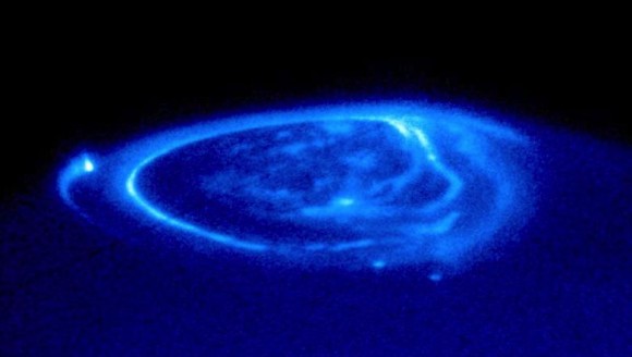 Juno will fly in a polar orbit above Jupiter, after it arrives there in 2016. One of its objectives will be to study Jupiter's beautiful aurora, shown here. Image via NASA and J. Clarke at University of Michigan via Wikimedia Commons.