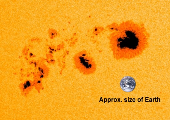 Just for fun, here's AR1944 again, with an image of Earth added for scale. This sunspot grouping is one of the largest in the last nine years. Image via NASA/SDO