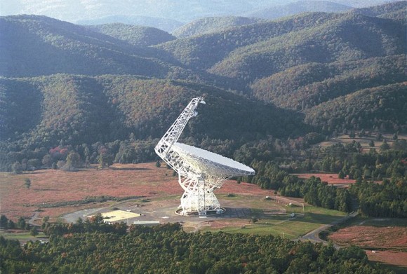 The Green Bank Telescope is about 100 yards wide and 485 feet tall, nearly as tall as the nearby mountains. It is the world's largest fully steerable radio telescope. The telescope is in a valley of the Allegheny mountains to shield the observations from radio interference. Image via Wikimedia Commons. 