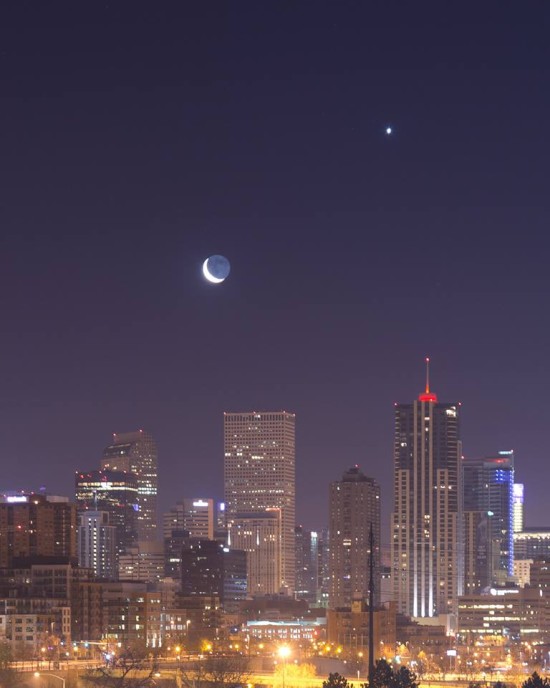 By the time dawn came to the western half of the U.S. this morning (February 26), the moon was below Venus.  Even light pollution couldn't diminish the view of them.  Photo from our friend Christy Sanchez in Denver.  Thanks, Christy.