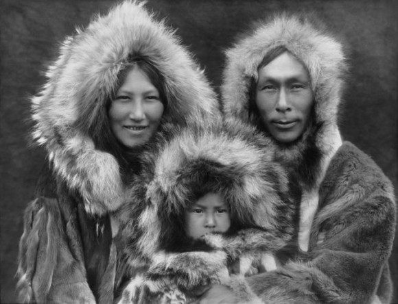 An Inupiat Eskimo family from Alaska in 1929, whose ancestors would have crossed Beringia thousands of years previously.  Image and caption via The Conversation.