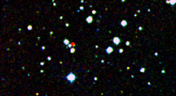 Is the red dot in this photo Planet X?  Nah.  It's just a nearby star standing out in front of the star background, in this image from the Second Generation Digitized Sky Survey. Image via DSS/NASA/JPL-Caltech
