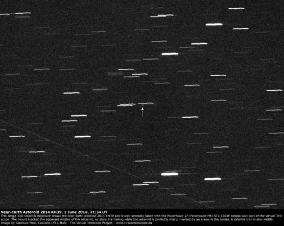Here is near-Earth asteroid 2014 KH39, caught while approaching Earth on June 1, 2014.   Image via the Virtual Telescope.  This image is a single 300-second exposure, taken while tracking the apparent motion of the asteroid.  The short trailed images are stars.  Asteroid 2014 KH39 was about 2 million km from us when this image was acquired. A satellite trail is also visible.