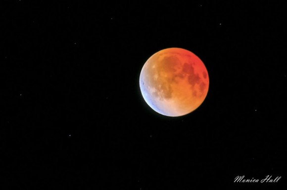 View larger. | Monica Hall captured this beautiful shot of the Japanese Lantern Effect - whereby the moon display swaths of various colors - during the April 2014 eclipse.  Read more about this photo.