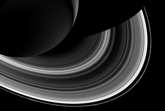 Cassini spied just as many regular, faint clumps in Saturn's narrow F ring (the outermost, thin ring), like those pictured here, as Voyager did. But it saw hardly any of the long, bright clumps that were common in Voyager images.  Image via Cassini.