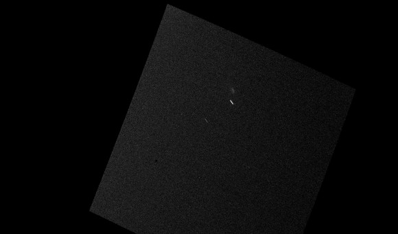Comet Siding Spring is a fuzzy streak to the upper right of the bright streak, as captured by the MastCam on the Mars Science Laboratory Curiosity. Image via NASA.