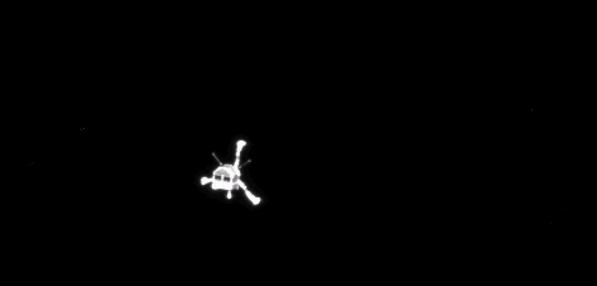 The Philae lander moves away from its mothership, the Rosetta spacecraft, on its way to a successful comet landing.