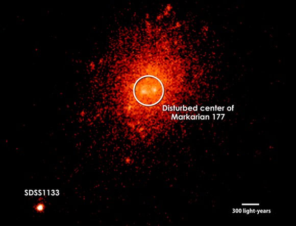 Using the Keck II telescope in Hawaii, researchers obtained high-resolution images of Markarian 177 and SDSS1133 using a near-infrared filter. Twin bright spots in the galaxy's central region are consistent with recent star formation, a disturbance that hints this galaxy may have merged with another. Image credit: W. M. Keck Observatory/M. Koss (ETH Zurich) et al. 