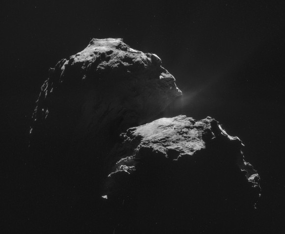 The night side of Comet 67P.  The resolution of this image mosaic of four NAVCAM images is about 2.68 meters, and the mosaic covers roughly 4.6 kilometers by 3.8 kilometers.   Image via Andrew R. Brown; read more about this image. 