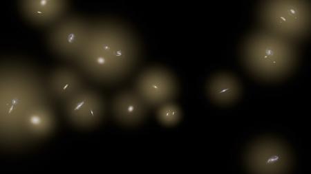 This artist's concept shows a view of a number of galaxies sitting in huge halos of stars. The stars are too distant to be seen individually and instead are seen as a diffuse glow, colored yellow in this illustration. The CIBER rocket experiment detected this diffuse infrared background glow in the sky -- and, to the astronomers’ surprise, found that the glow between galaxies equals the total amount of infrared light coming from known galaxies. Image credit: NASA/JPL-Caltech 