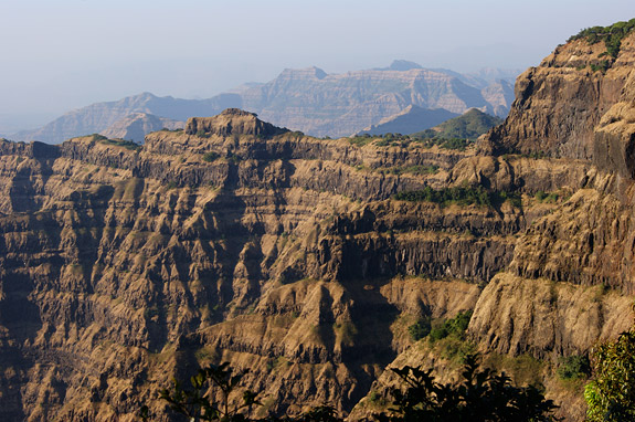 A new geological timeline from Princeton University researchers shows that a series of massive eruptions 66 million years ago in a primeval volcanic range in western India known as the Deccan Traps played a role in the extinction event that claimed Earth's non-avian dinosaurs, and challenges the dominant theory that a meteorite impact was the sole cause of the extinction. Pictured above are the Deccan Traps near Mahabaleshwar, India. Image courtesy of Gerta Keller, Department of Geosciences