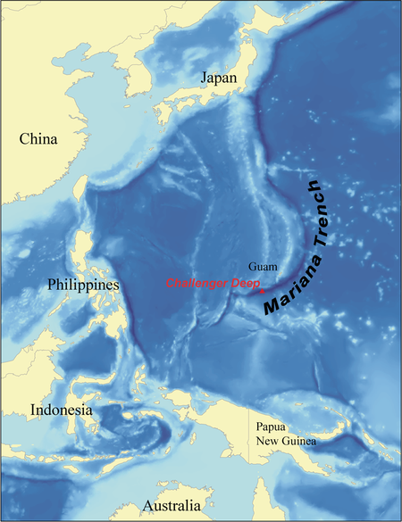 Mariana Trench in the western Pacific.  The trench is some 1,580 miles long (about 2,550 km), with an average width of only 43 miles (69 km).   Image via Wallace at Wikimedia Commons.