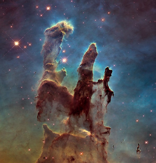 View larger. | New view of the Pillars of Creation.  There's evidence to suggest our sun formed in a similar turbulent star-forming region to the one we see in this image.  Image via NASA, ESA/Hubble and the Hubble Heritage Team. 