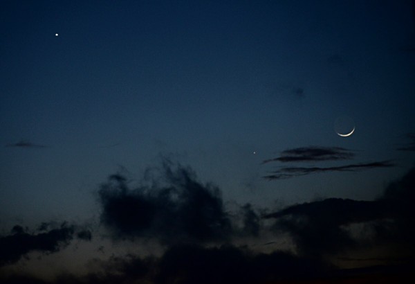 The dance of Venus, Mercury and a tiny moon, just after sunset on January 21, 2015, from Matera, Italy. Photo by Nicola D'antona of the Osservatorio Astronomico Università di Siena.