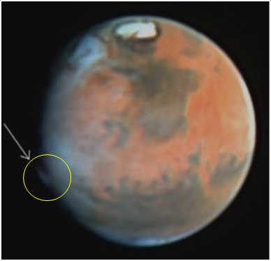 A curious plume-like feature was observed on Mars on 17 May 1997 by the Hubble Space Telescope. It is similar to the features detected by amateur astronomers in 2012, although appeared in a different location.