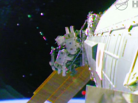 Spacewalkers Terry Virts and Barry Wilmore work outside Pressurized Mating Adapter-2. Image credit: NASA TV