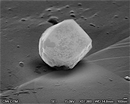 Electron microscope image of dust from interstellar space. Interstellar dust grains are typically about 100 nanometers (one nanometer is one millionth of a millimeter) and are made up of either carbon (soot) or silicates (fine sand).