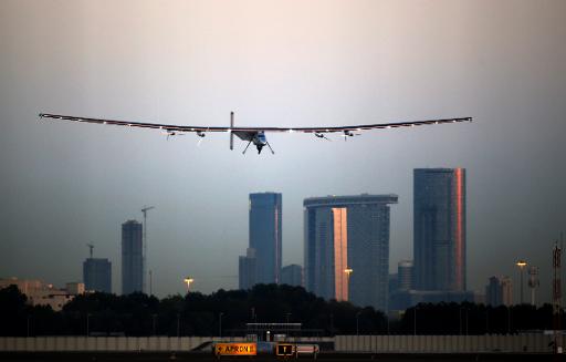 The solar-powered plane Solar Impluse 2 lands at the Al-Bateen airport in Emirati capital Abu Dhabi on March 2, 2015. 