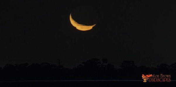 Moonset on May 22 as seen from Australia.  Notice that the moon is angled differently from the S. Hemisphere than, for example, in the photo above, which was taken from Massachusetts.  This photo is by our friend Lynton Brown Landscapes.  Thank you, Lynton!