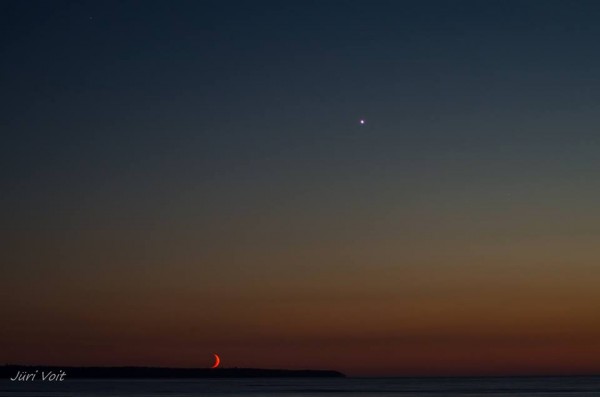 Juri Voit in Estonia caught the moon and Venus on May 21, just as the moon was setting.  Thank you, Juri!