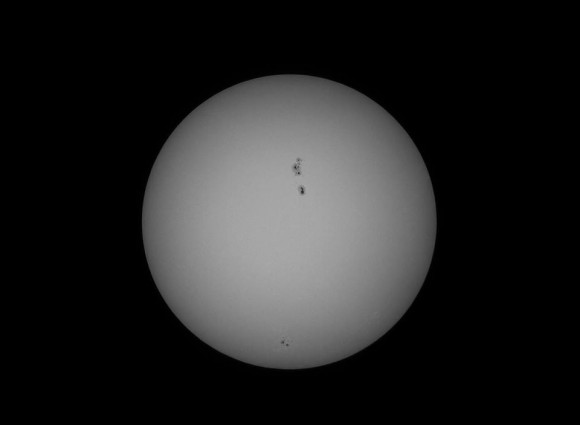 Sunspots June 20, 2015 from EarthSky Facebook friend Alexander Kozik.  Afocal photography through Plossl 32mm and Celestron XLT 102 refractor. 