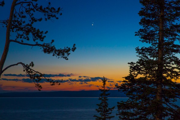 Venus and Jupiter over Yellowstone Lake in Yellowstone National Park, Wyoming, on June 30, from Jack Webb.