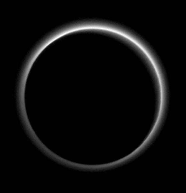 View larger. |Never-before-seen night side of Pluto, seen as New Horizons swept past the planet in July, 2015.