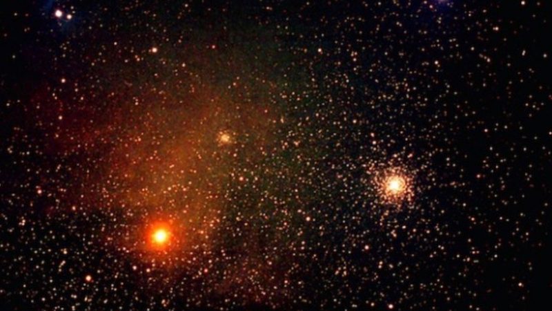 Red star Antares, right, and nearby star cluster M4 via StargazerBob.com@aol.com