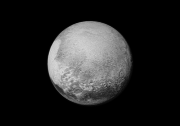 Pluto’s bright, mysterious “heart” is rotating into view, ready for its close-up on close approach, in this image taken by New Horizons on July 12 from a distance of 1.6 million miles (2.5 million kilometers). It is the target of the highest-resolution images that will be taken during the spacecraft’s closest approach to Pluto on July 14. The intriguing “bulls-eye” feature at right is rotating out of view, and will not be seen in greater detail. Image credit: NASA/JHUAPL/SWRI