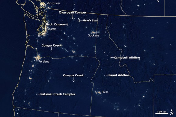 This  night time image was acquired on August 19 by the Suomi NPP satellite. The image was made possible by the instrument’s “day-night band,” which uses filtering techniques to observe dim signals including those from wildfires. Labels point to the large, actively burning fires in the region.