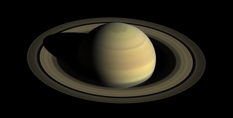 Gorgeous Cassini spacecraft image of Saturn, showing a banded planet and rings nearly wide open.