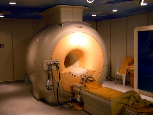 An fMRI scanner uses a strong magnetic field to track blood flow in the brain. Photo credit: KasugaHuang