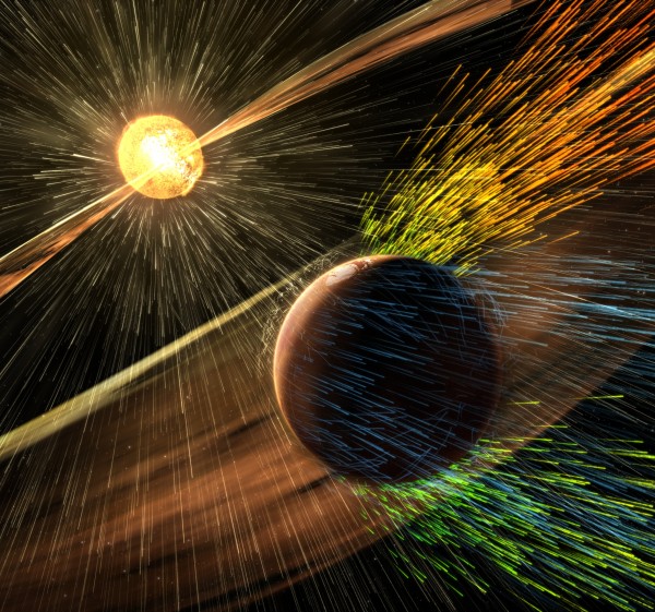Artist’s rendering of a solar storm hitting Mars and stripping ions from the planet's upper atmosphere. Image credit: NASA/GSFC