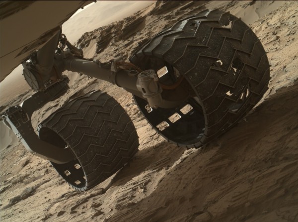 Damage on the aluminum wheels is evident after 7 miles (11.3 km) on the odometer of the Curiosity rover. Mars' terrain and diverse rocks led to more wheel damage than was expected. However scientists think the 20 inches (51 cm) wheels may permit the rover to continue its mission. Image via NASA/JPL-Caltech/MSSS