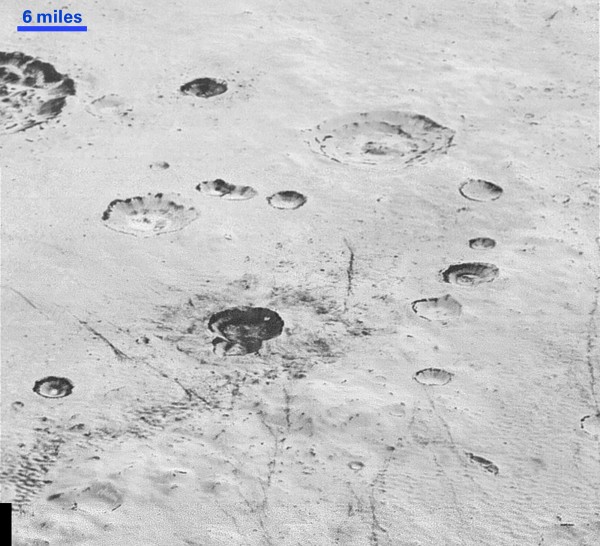 Layered craters in Pluto's icy crust.
