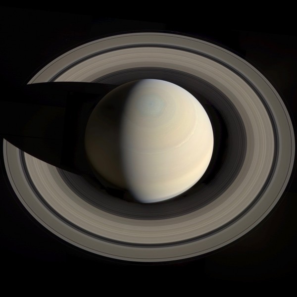 In October 2013, Cassini flew high above Saturn, looking down toward its north pole. It took a series of shots that were then assembled into this amazing mosaic by software engineer Gordan Ugarkovic.