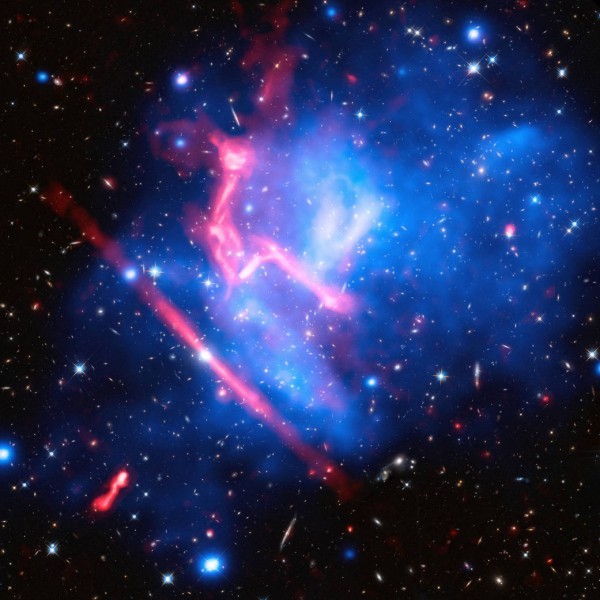 Galaxy cluster MACS J0717. X-ray image via NASA/CXC/SAO/van Weeren et al.; Optical image via NASA/STScI; Radio: NSF/NRAO/VLA.