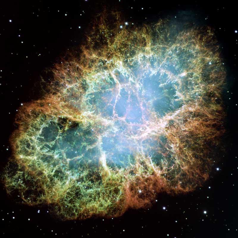 Explosion ovale colorée dans l'espace avec un contour déchiqueté et des taches sombres et claires.