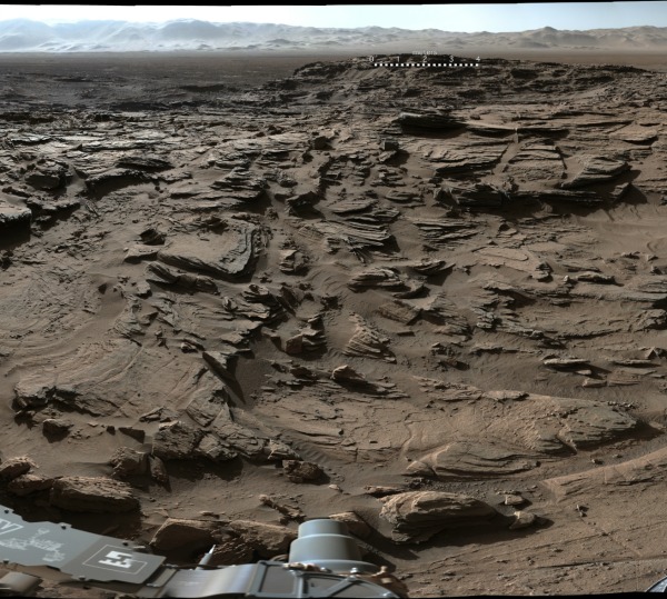 Image taken from the Mastcam on NASA's Curiosity Mars rover shows the rugged surface of the Naukluft Plateau, plus upper Mount Sharp at right and part of the rim of Gale Crater. Image credit: NASA/JPL-Caltech/MSSS