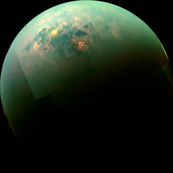 Sunlight glints off of Titan's northern seas this near-infrared, color mosaic from NASA's Cassini spacecraft. Image credit: NASA/JPL/Univ. Arizona/Univ. Idaho