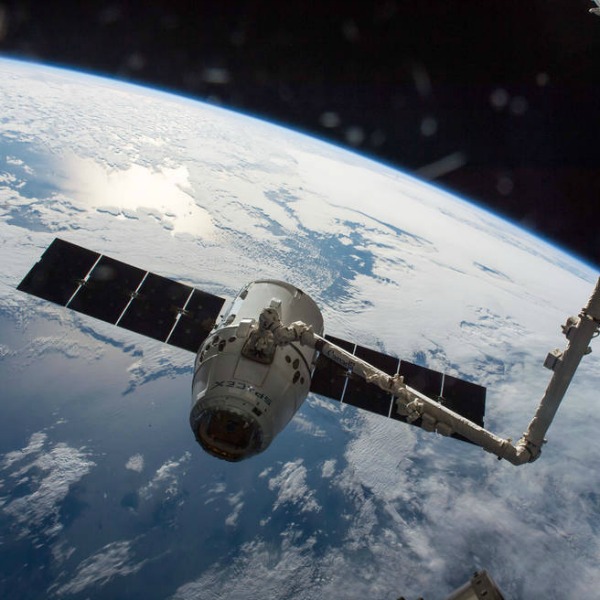 The SpaceX Dragon cargo spaceship is grappled by the International Space Station's Canadarm2. The spacecraft delivered about 7,000 pounds of science and research investigations on April 10, including the Bigelow Expandable Activity Module (BEAM). Image credit: NASA