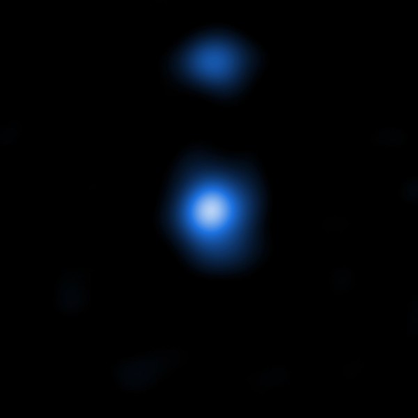 This image shows one of two detected supermassive black hole seeds, OBJ29323, as it is seen by the NASA Chandra Space Telescope. The properties of the X-ray data match those predicted by models produced by the Italian research team. Image via NASA/CXC/Scuola Normale Superiore/Pacucci