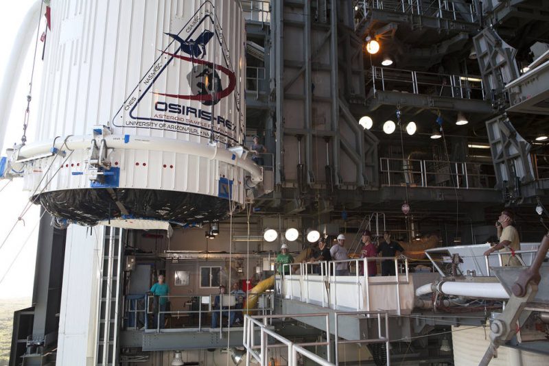 he OSIRIS-REx spacecraft, enclosed in a payload fairing, is lifted Aug. 29 at Space Launch Complex 41 at Cape Canaveral Air Force Station in Florida. The United Launch Alliance Atlas V rocket that is to lift OSIRIS-REx into space was stacked at SLC-41 so the spacecraft and fairing could be hoisted up and bolted to the rocket. Image via NASA/Dimitri Gerondidakis