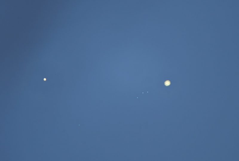 Robert Pettengill was in Uvalde, Texas when he captured the images to make this composite.  It consists of a total of 39 images and shows the relative sizes of the 2 planets as seen from Earth, as well as some of Jupiter's moons.